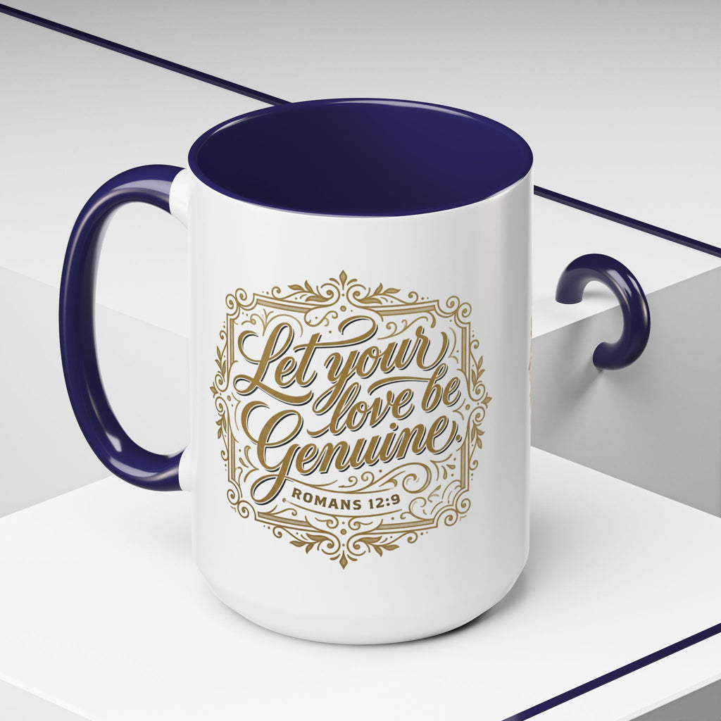 Inspirational ceramic accent coffee mug featuring Romans 12:9 and the message “Let Your Love Be Genuine” in elegant gold script with decorative flourishes and black accent handle and interior.