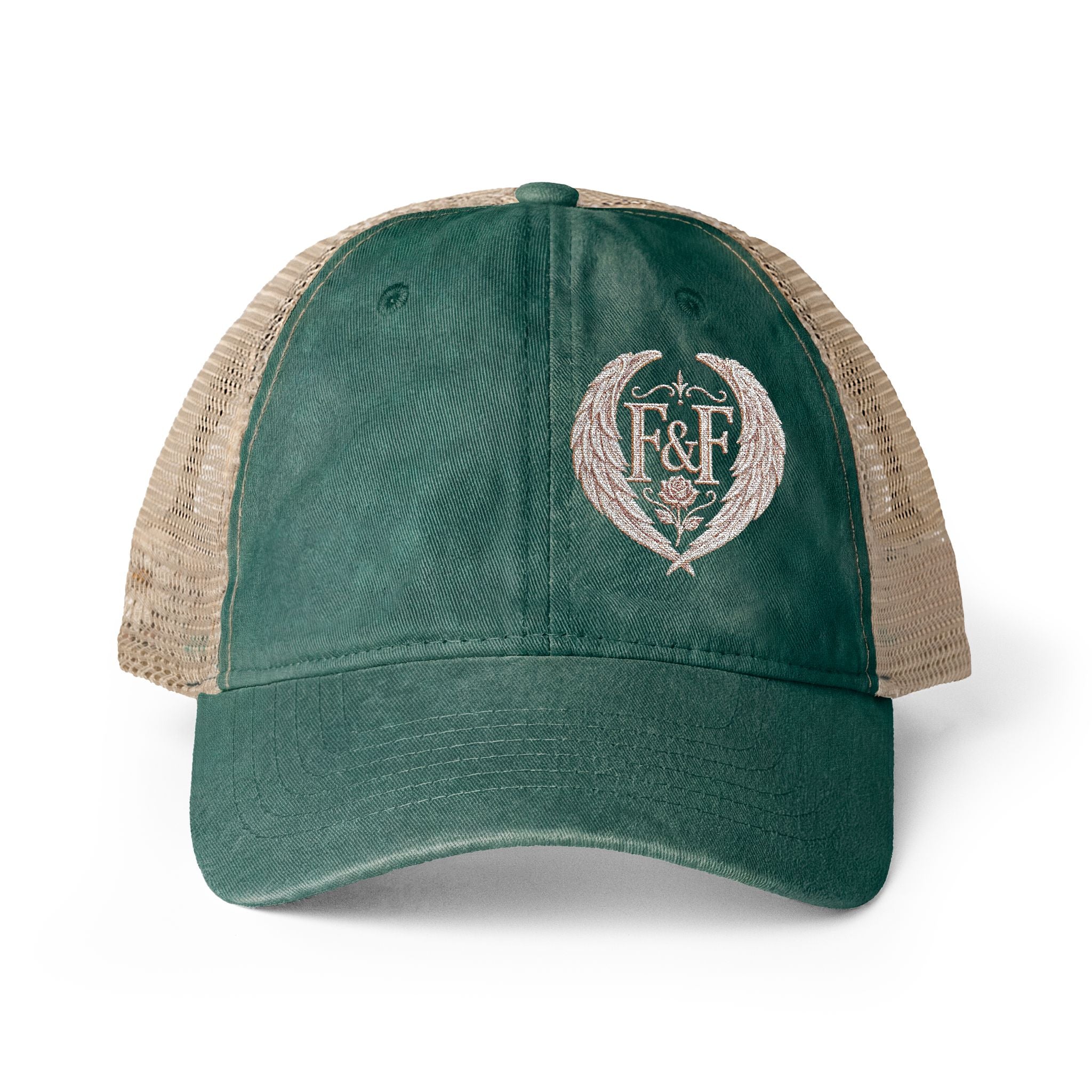 Women’s washed mesh-back cap featuring the Faith & Freedom logo with vintage styling, breathable mesh panels, and concealed ponytail opening.