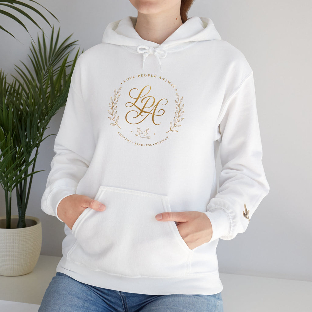 Inspirational Christian hoodie featuring elegant “Love People Anyway” script typography on a soft, cozy hooded sweatshirt designed to encourage kindness and compassion.