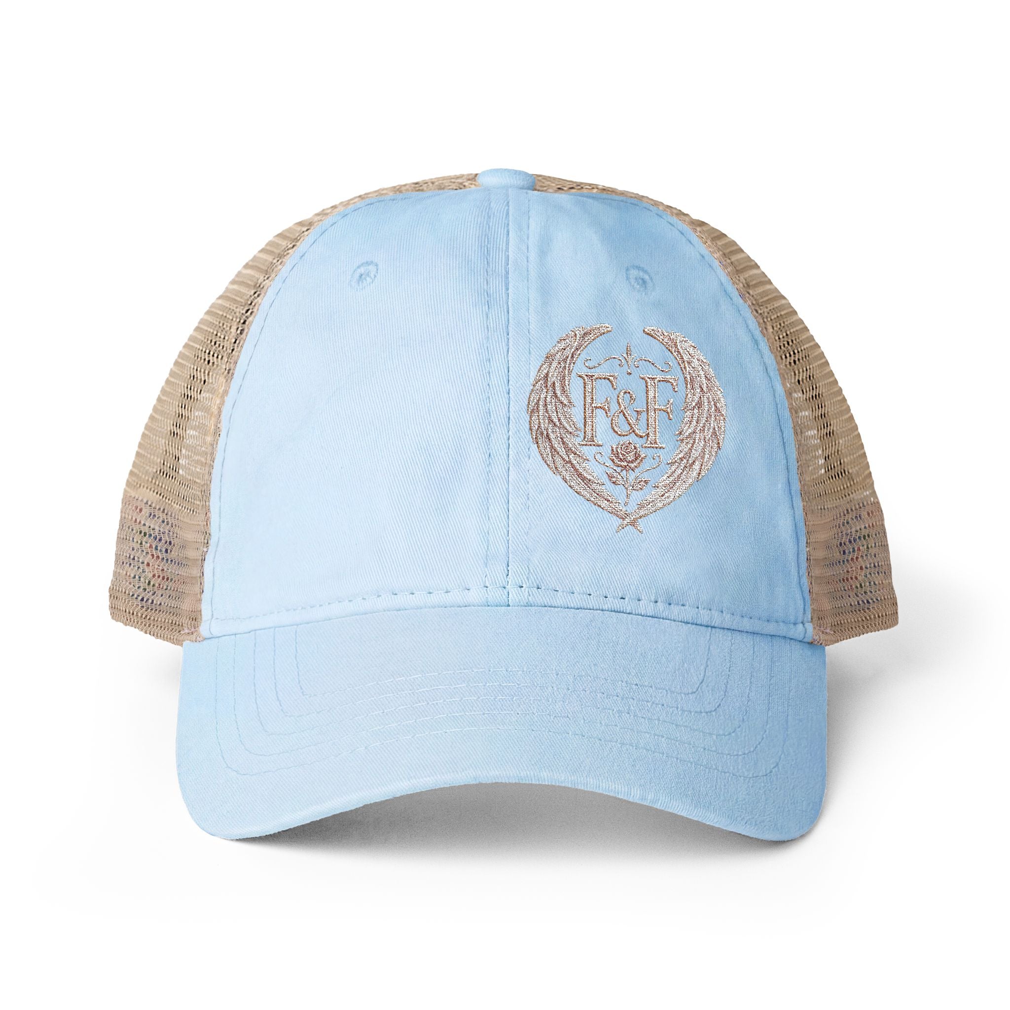Women’s washed mesh-back cap featuring the Faith & Freedom logo with vintage styling, breathable mesh panels, and concealed ponytail opening.