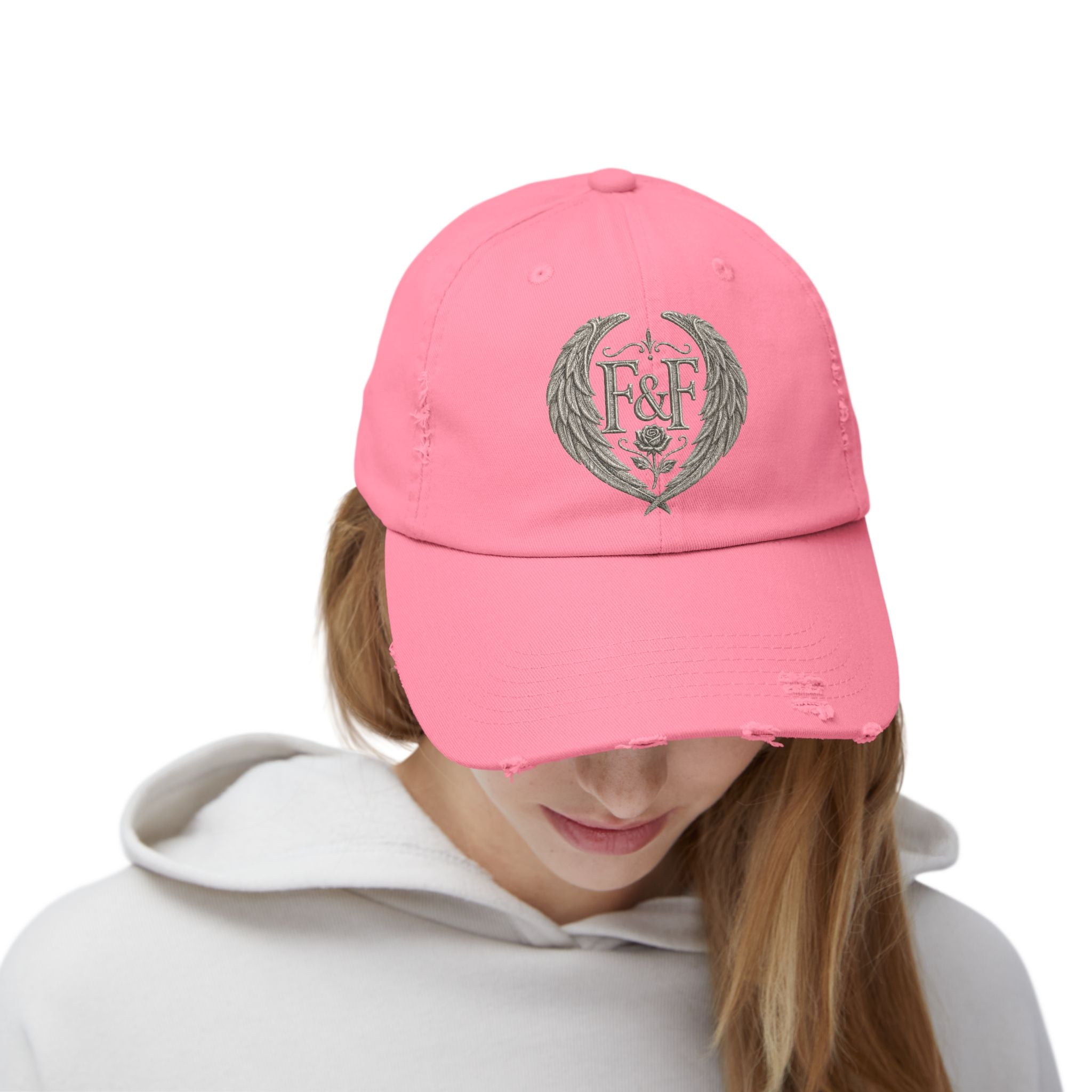 Distressed black Christian cap featuring the Faith & Freedom wing crest logo with feathered wings and vintage washed low-profile styling.