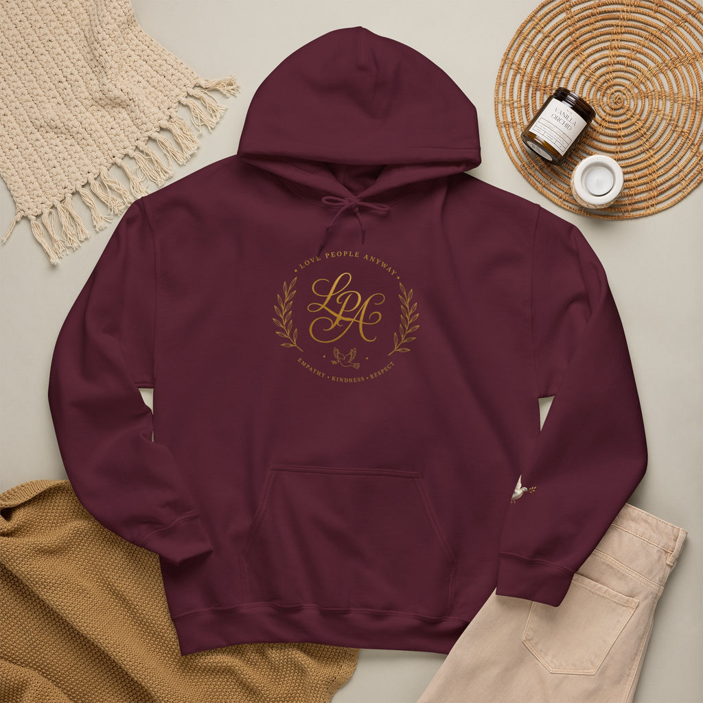 Inspirational Christian hoodie featuring elegant “Love People Anyway” script typography on a soft, cozy hooded sweatshirt designed to encourage kindness and compassion.