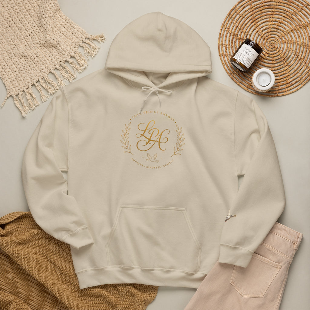 Inspirational Christian hoodie featuring elegant “Love People Anyway” script typography on a soft, cozy hooded sweatshirt designed to encourage kindness and compassion.
