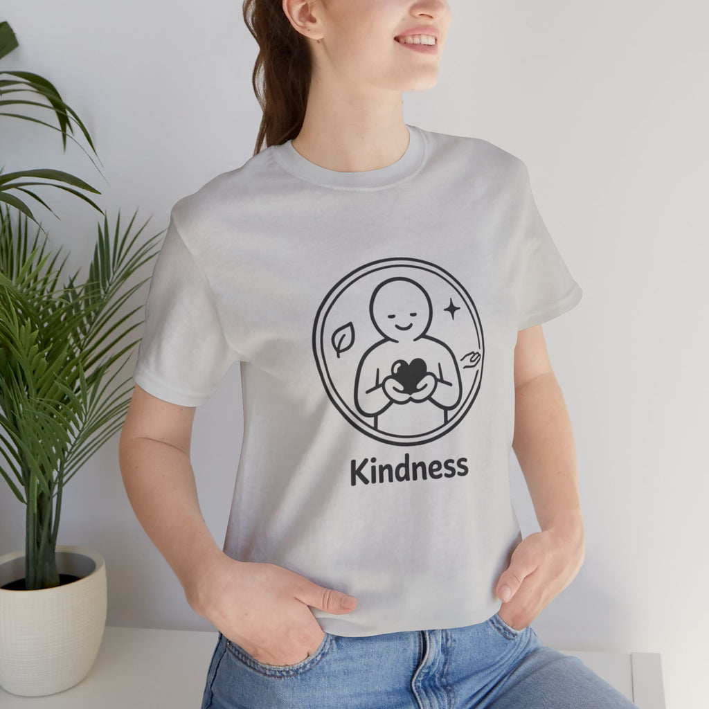 Minimalist inspirational t-shirt featuring a simple line-art heart emblem and the word “Kindness” on a soft lightweight casual tee.