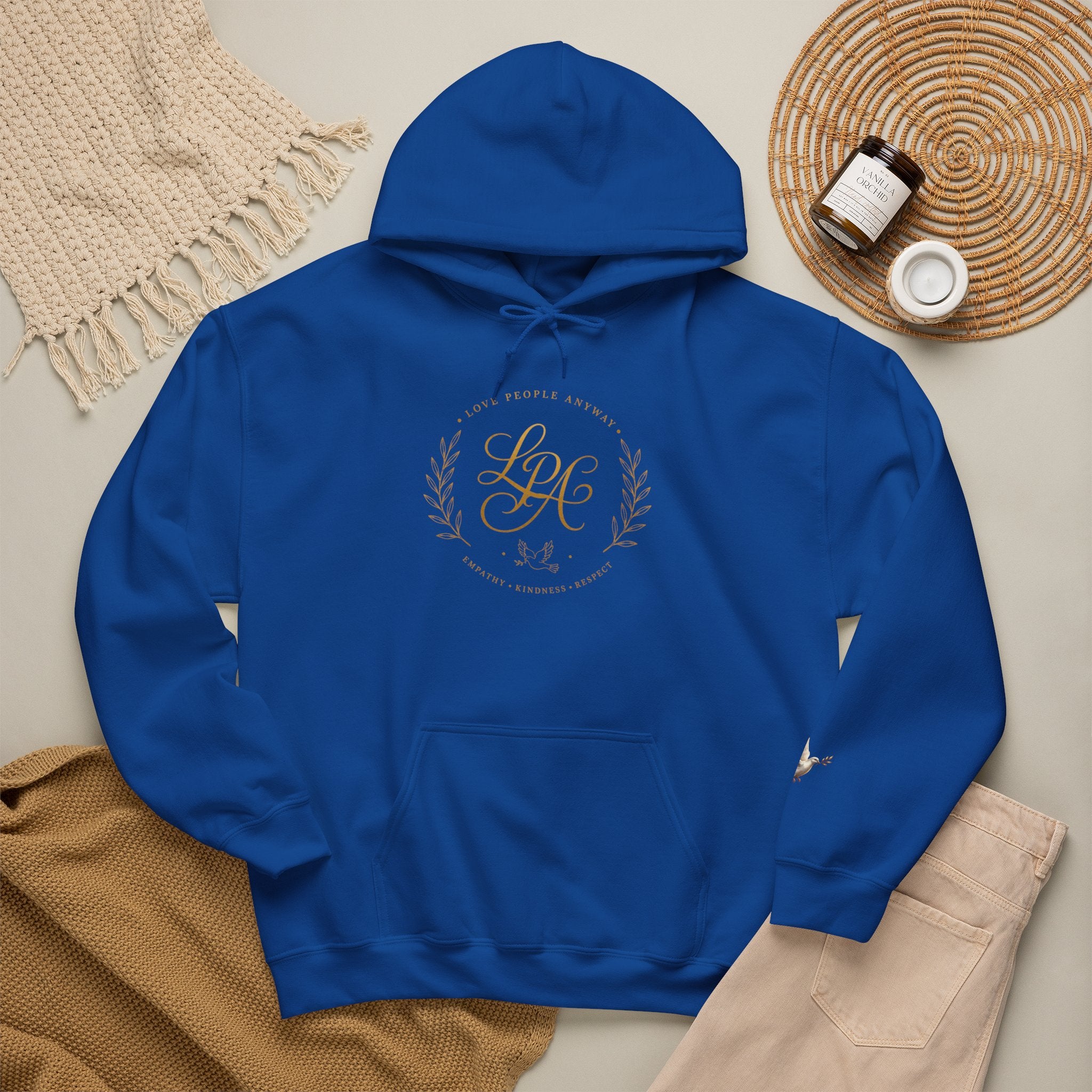 Inspirational Christian hoodie featuring elegant “Love People Anyway” script typography on a soft, cozy hooded sweatshirt designed to encourage kindness and compassion.