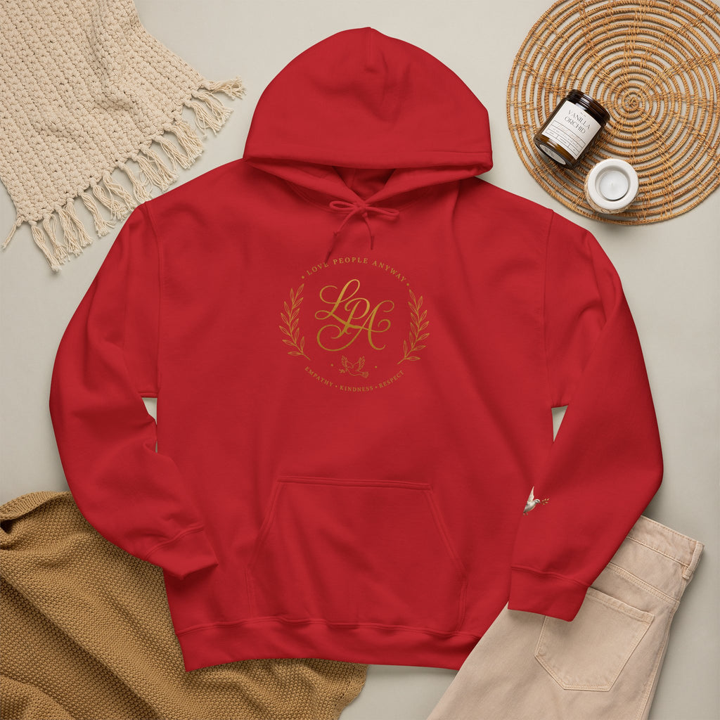 Inspirational Christian hoodie featuring elegant “Love People Anyway” script typography on a soft, cozy hooded sweatshirt designed to encourage kindness and compassion.