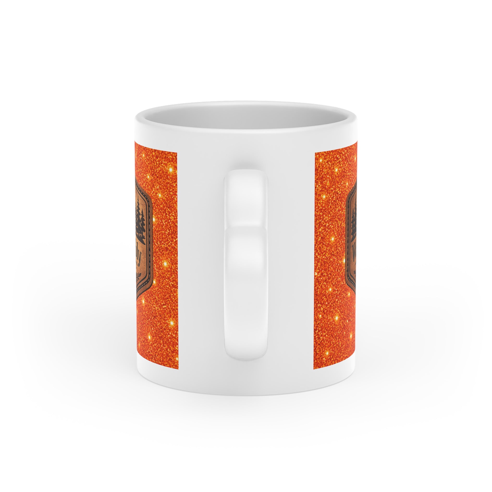 White ceramic heart-shaped handle mug featuring a rustic mountain "Walk Humbly" badge inspired by Micah 6:8 on a sparkling orange background.
