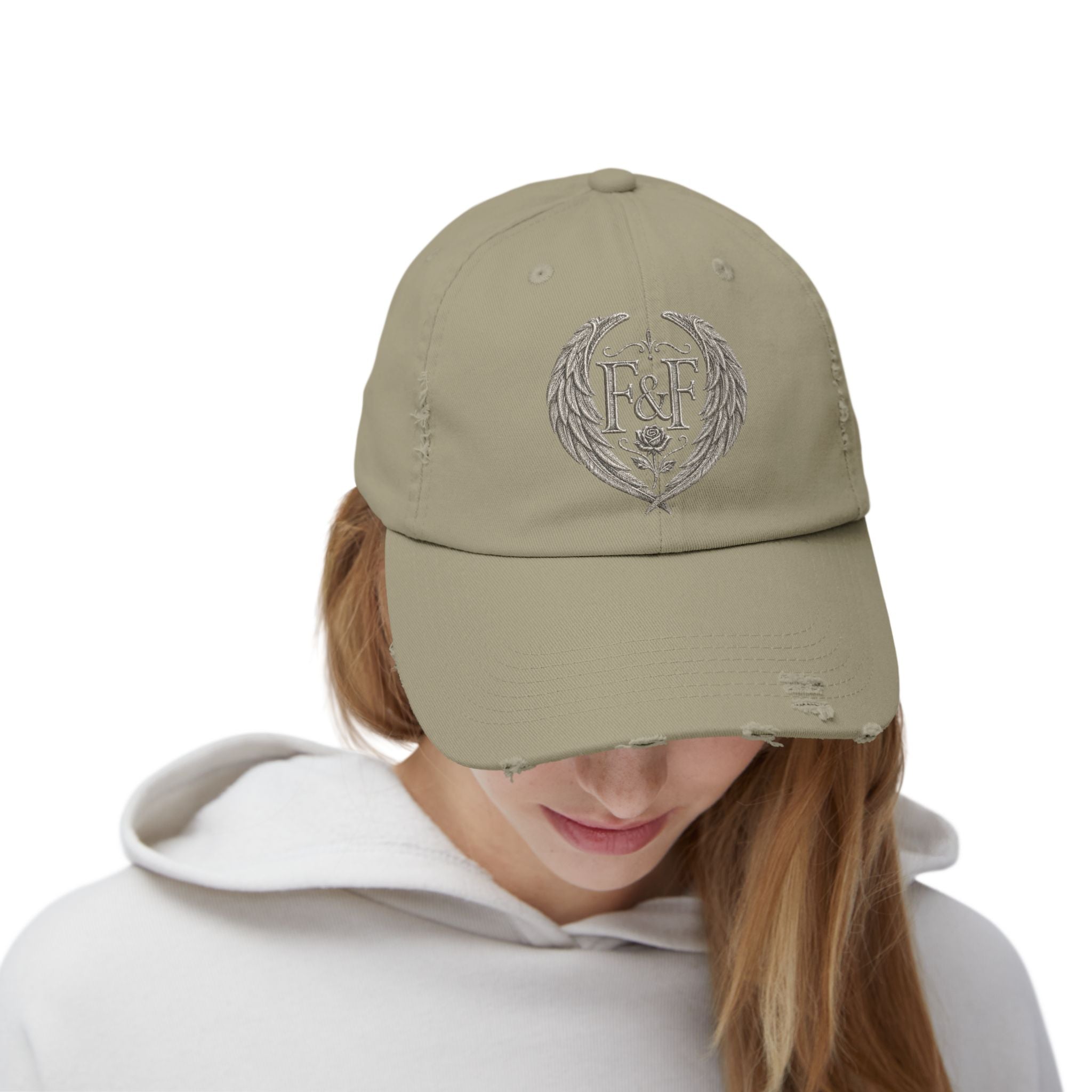 Distressed black Christian cap featuring the Faith & Freedom wing crest logo with feathered wings and vintage washed low-profile styling.