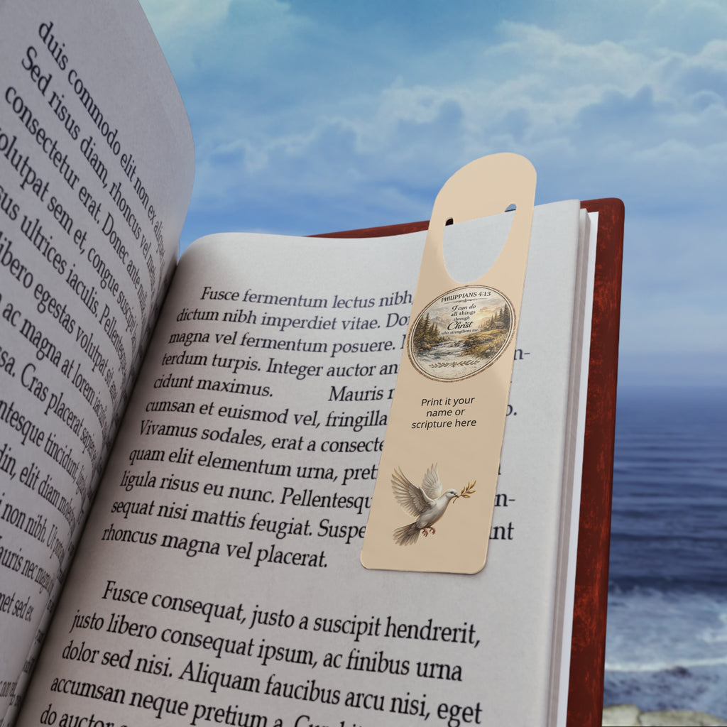 Personalized Christian aluminum bookmark featuring a peaceful dove, Philippians 4:13 scripture medallion, custom name option, brushed metal backing, and secure page-holding slot.