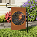 Inspirational Christian garden flag featuring a glowing lighthouse sunset with Romans 15:13 scripture artwork in warm coastal-inspired tones.