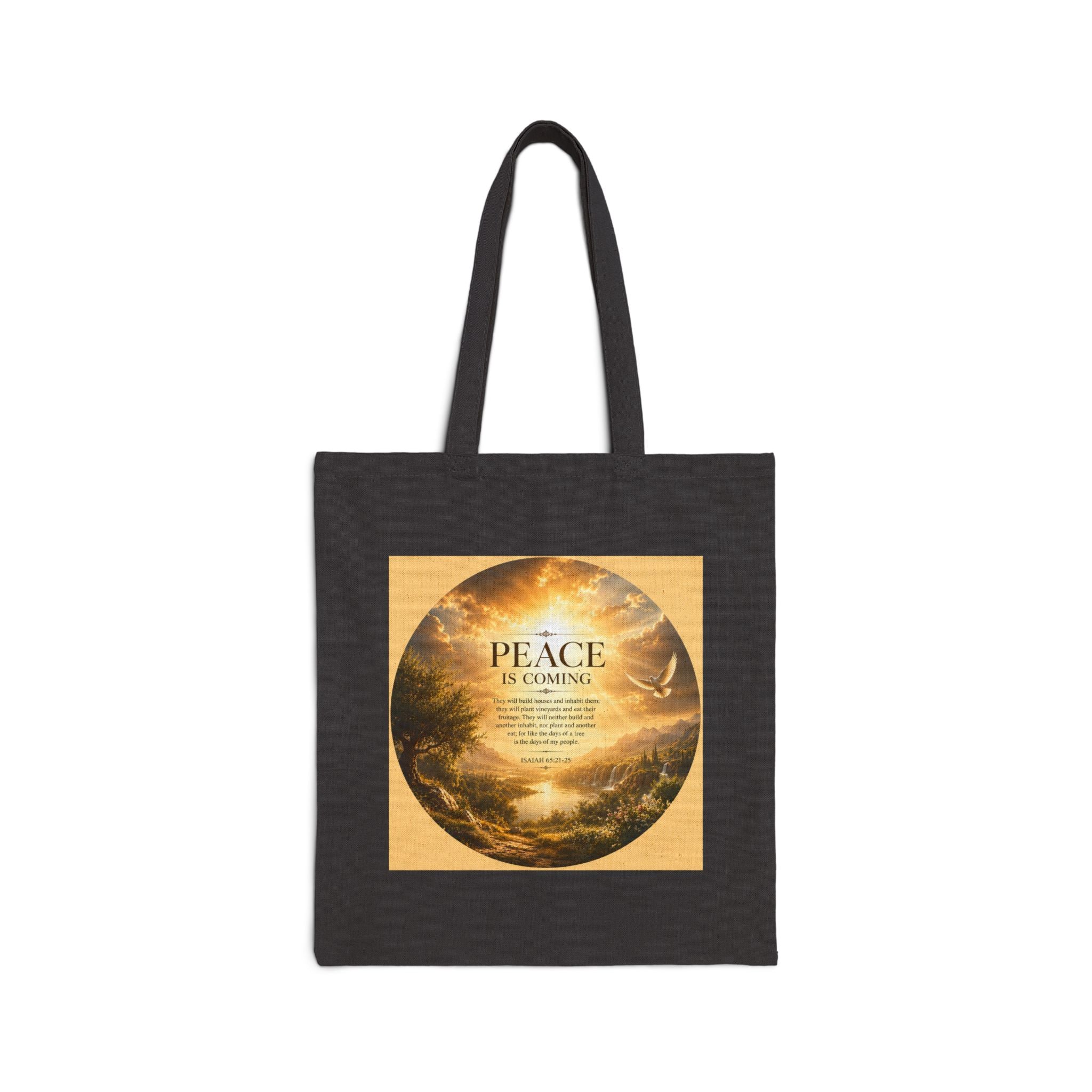 Christian cotton canvas tote bag featuring Isaiah 65:21-25 and the message “Peace Is Coming,” with golden paradise landscape artwork, waterfalls, mountains, river, white dove, and radiant sunlight.