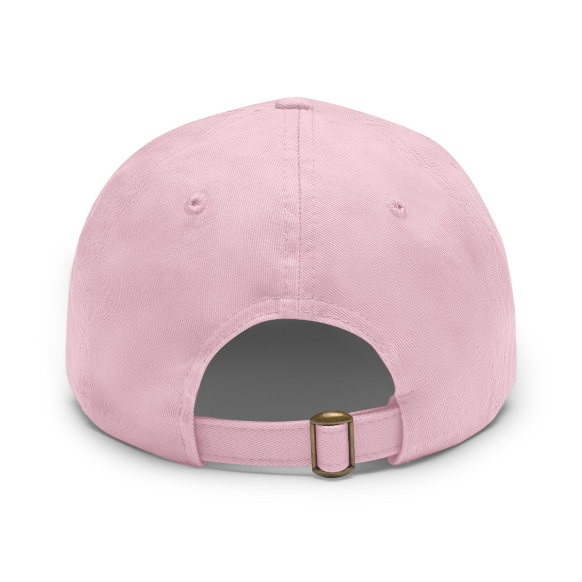Back view of a light pink cotton dad hat showing the adjustable self-fabric strap with an antique brass tri-glide buckle and unstructured six-panel construction.