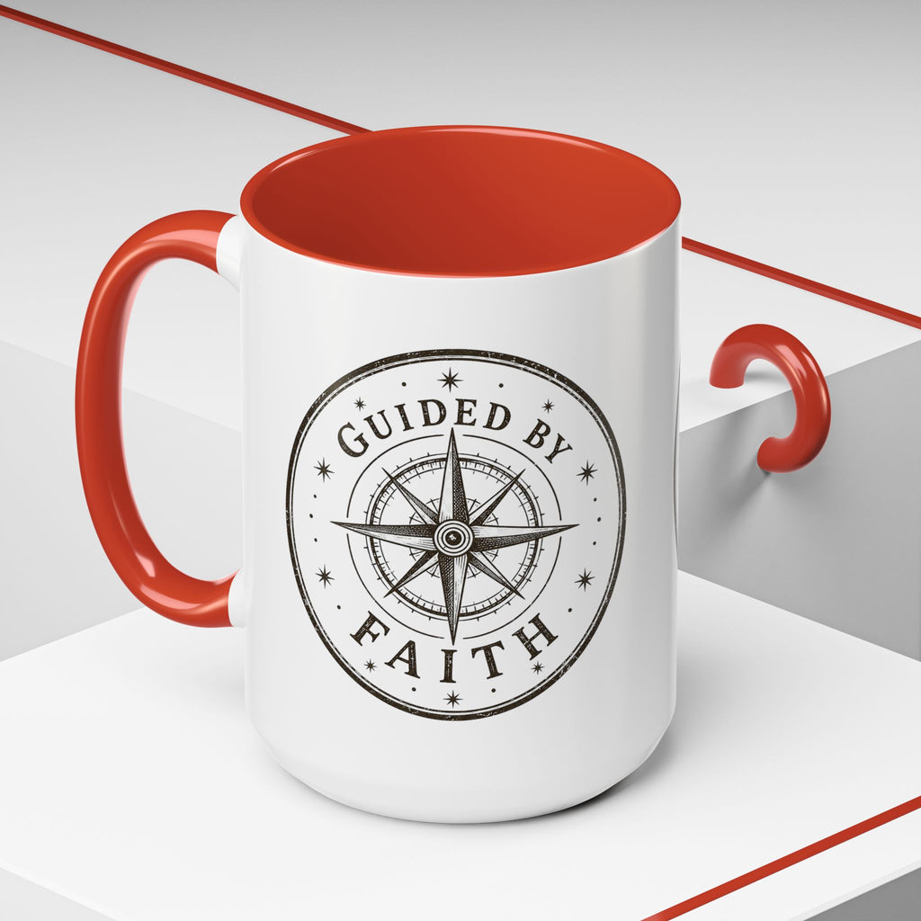 Inspirational ceramic accent coffee mug featuring a compass design and “Guided by Faith” message with colorful handle and interior accents on a glossy white mug.