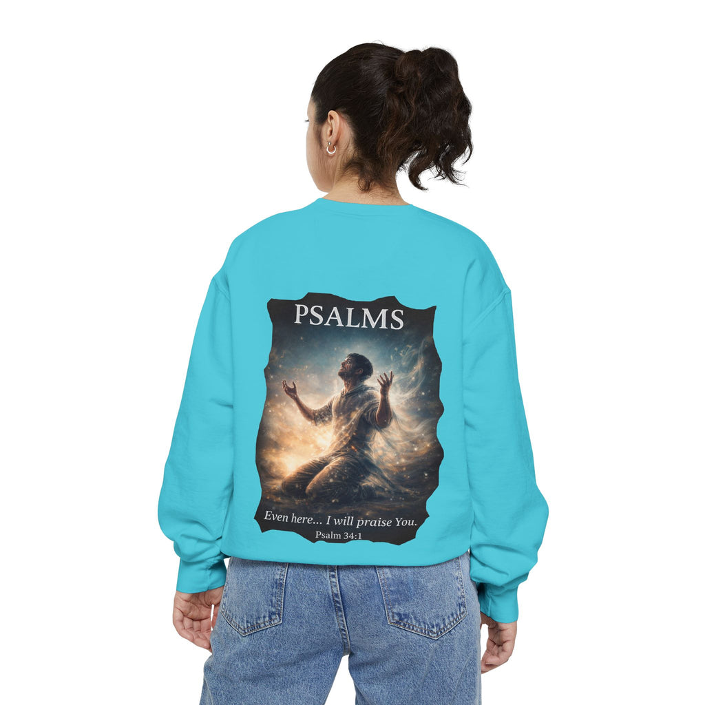 Christian crewneck sweatshirt featuring Psalm 34:1 inspired devotional artwork with subtle front embroidery and a dramatic faith-inspired back design.