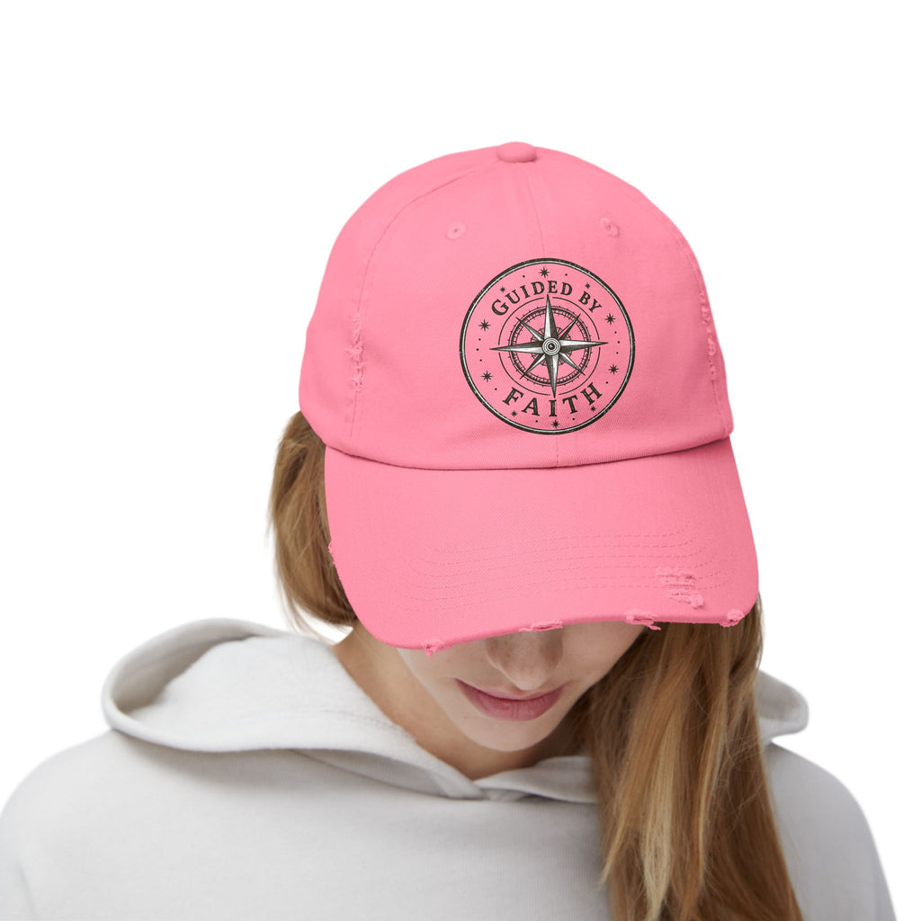 Vintage distressed Christian baseball cap featuring a compass emblem and the phrase “Guided by Faith” on a soft low-profile cotton twill hat.