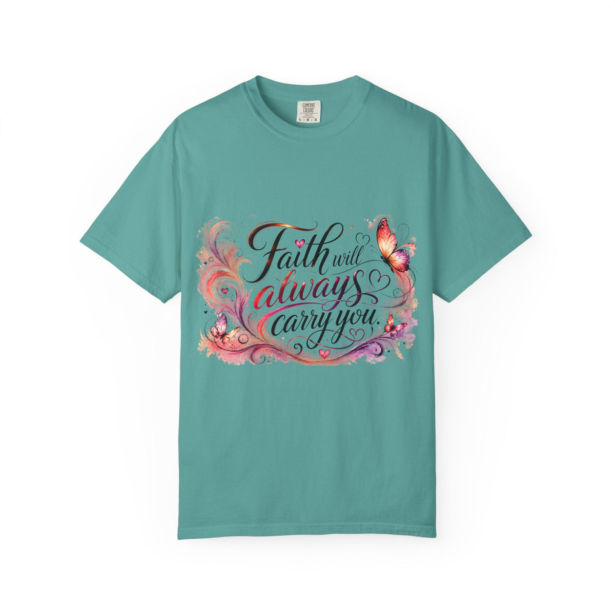 A teal short-sleeve crewneck t-shirt featuring a colorful graphic on the front with the phrase 'Faith will always carry you' in stylized script, decorated with butterflies, flowers, and swirls in pink, purple, orange, and gold.