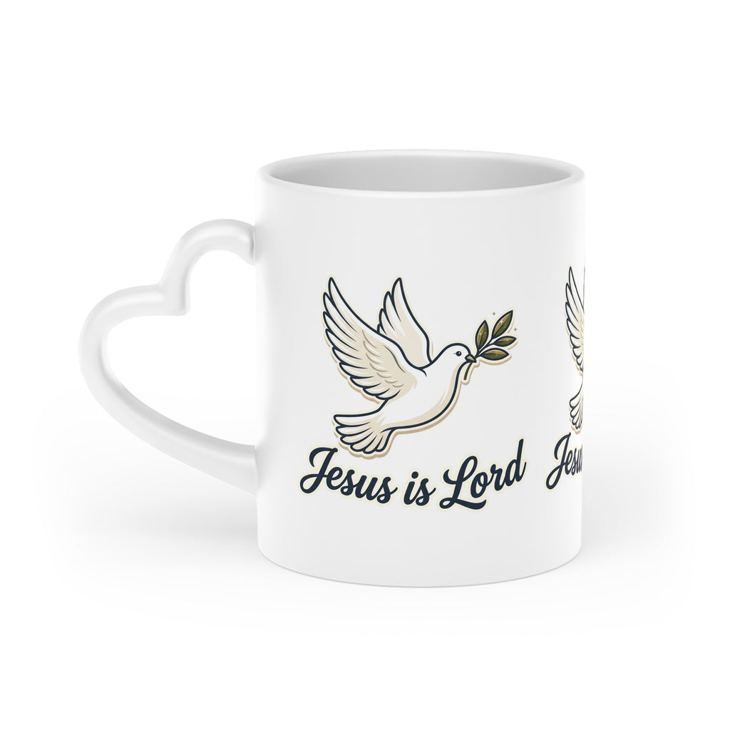 White ceramic heart-shaped handle mug featuring repeating white doves carrying olive branches with the words "Jesus Is Lord" in elegant script.