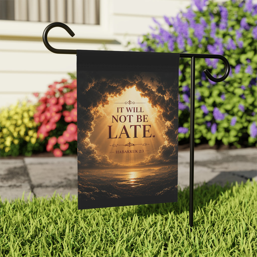 Inspirational garden flag featuring a peaceful sunrise scene with the words “It Will Not Be Late” inspired by Habakkuk 2:3 in warm golden tones.