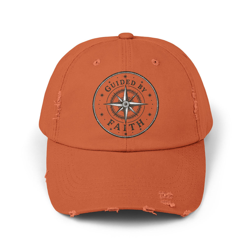 Vintage distressed Christian baseball cap featuring a compass emblem and the phrase “Guided by Faith” on a soft low-profile cotton twill hat.