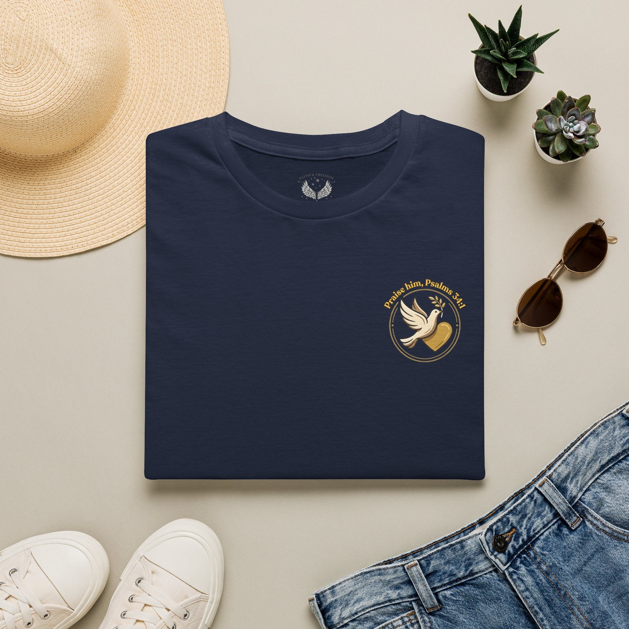 Minimalist Christian T-shirt featuring a Dove of Peace chest emblem with the words “Pray, Love, Remember” on a soft lightweight faith-inspired tee.