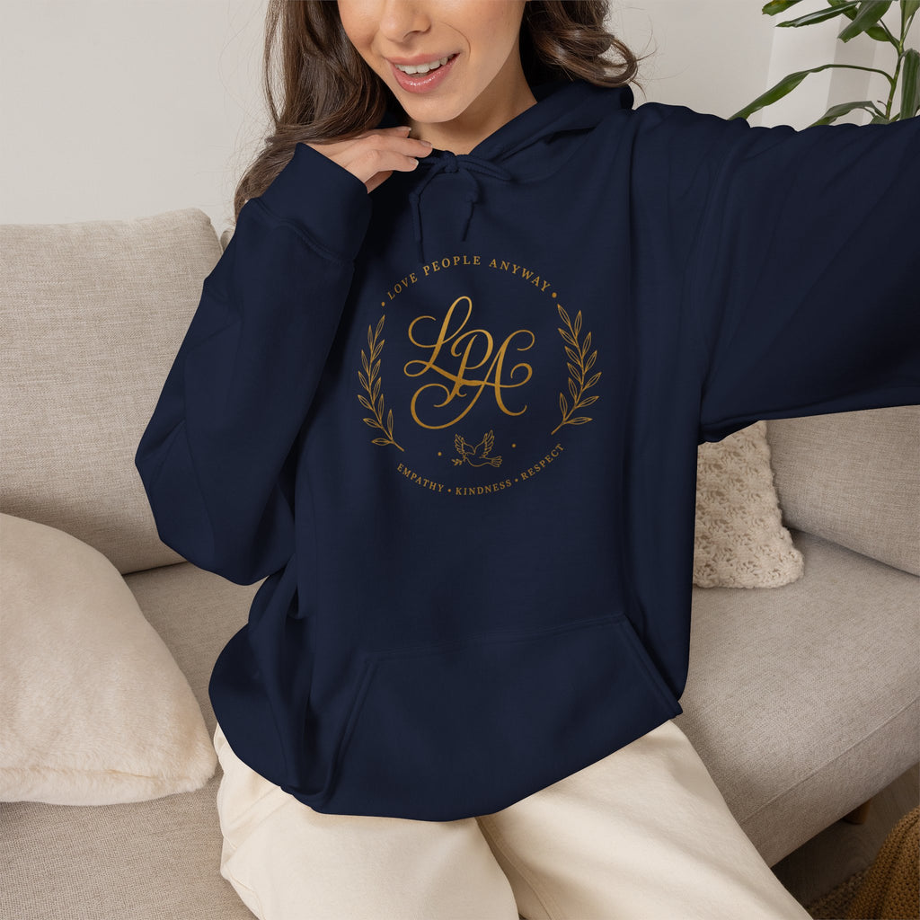 Inspirational Christian hoodie featuring elegant “Love People Anyway” script typography on a soft, cozy hooded sweatshirt designed to encourage kindness and compassion.
