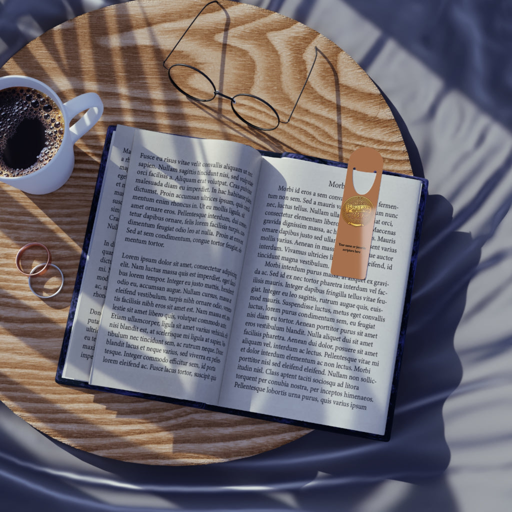 Personalized Christian aluminum bookmark featuring the word “Faith” and Psalm 34:1 in elegant gold-toned artwork with custom name option, brushed metal backing, and secure page-holding slot.