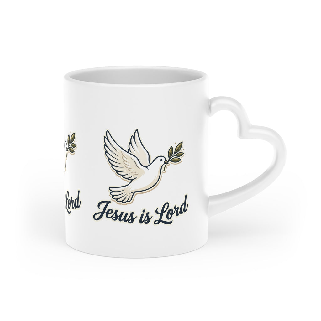 White ceramic heart-shaped handle mug featuring repeating white doves carrying olive branches with the words "Jesus Is Lord" in elegant script.