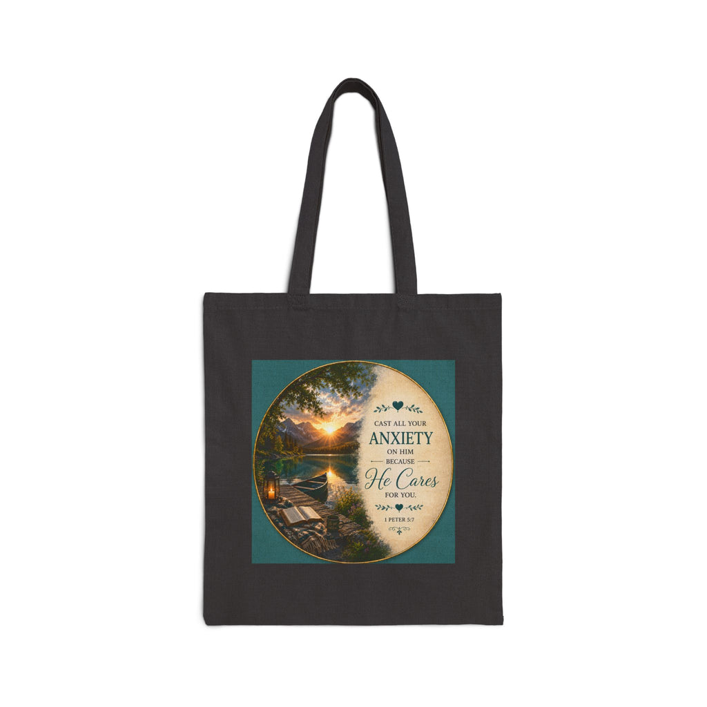 Christian cotton canvas tote bag featuring 1 Peter 5:7, “Cast All Your Anxiety on Him,” with peaceful nature-inspired artwork and reinforced shoulder straps for church, Bible study, shopping, and everyday use.