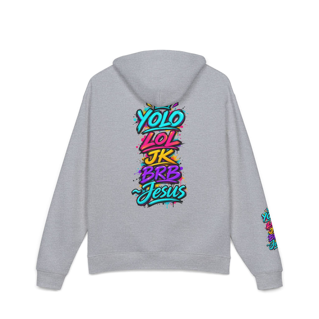 A light gray heather hoodie shown from the back, featuring a colorful graffiti-style text graphic that reads 'YOLO LOL JK BRB Jesus' in bright neon colors. A smaller matching graphic is printed on the left sleeve.
