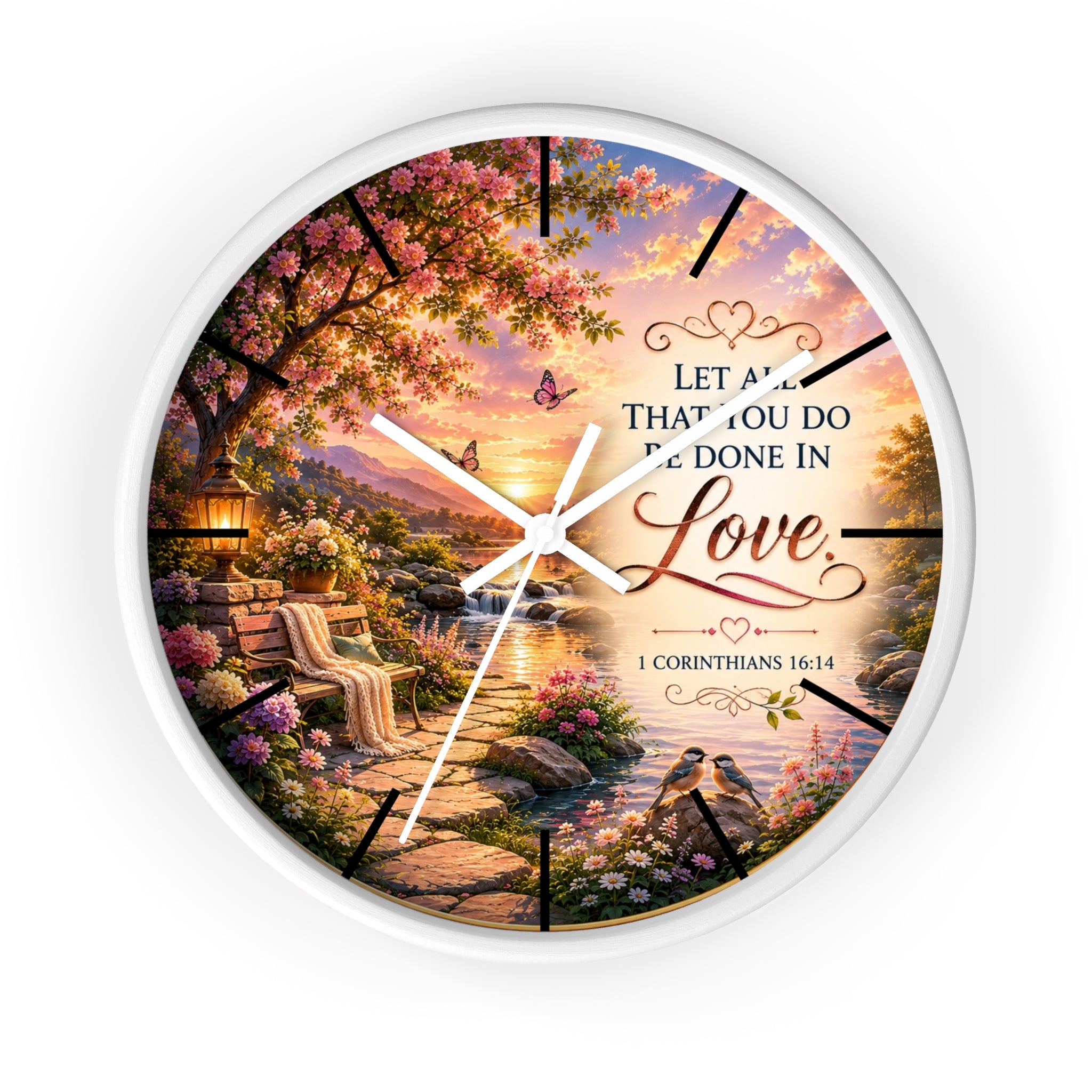 Inspirational Christian wall clock featuring a flower-lined lakeside sunrise scene with 1 Corinthians 16:14 scripture about doing all things in love.
