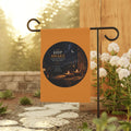 Inspirational garden flag featuring candlelight, a crescent moon, and a glowing stone pathway with the phrase “KEEP AWAKE” in warm golden tones against deep indigo skies.