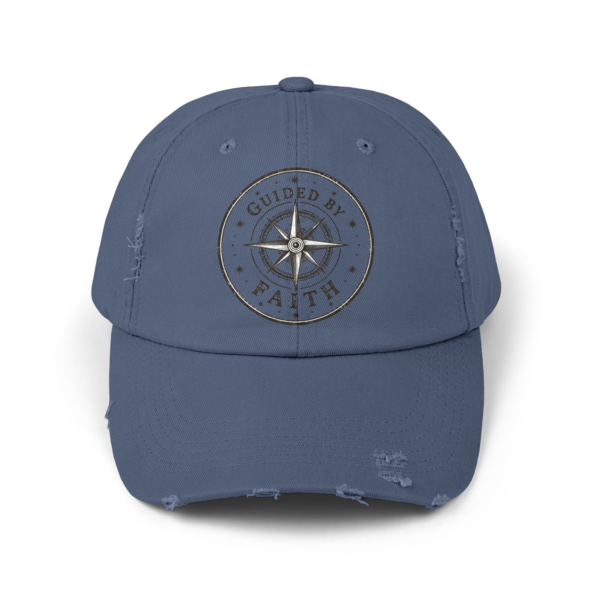 Vintage distressed Christian baseball cap featuring a compass emblem and the phrase “Guided by Faith” on a soft low-profile cotton twill hat.