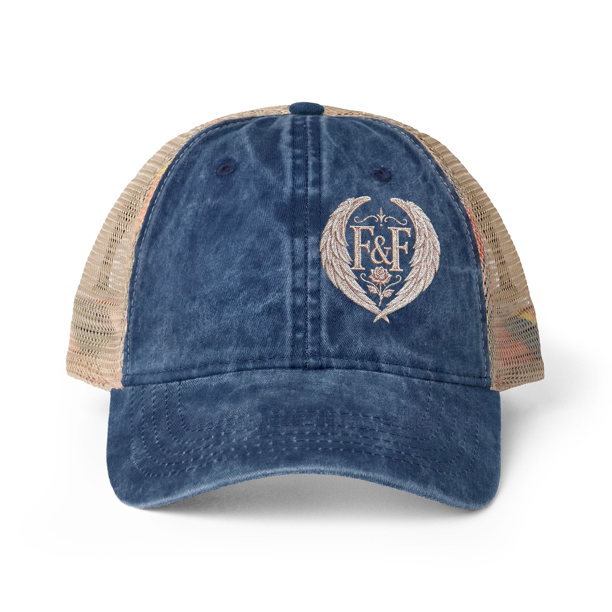Women’s washed mesh-back cap featuring the Faith & Freedom logo with vintage styling, breathable mesh panels, and concealed ponytail opening.