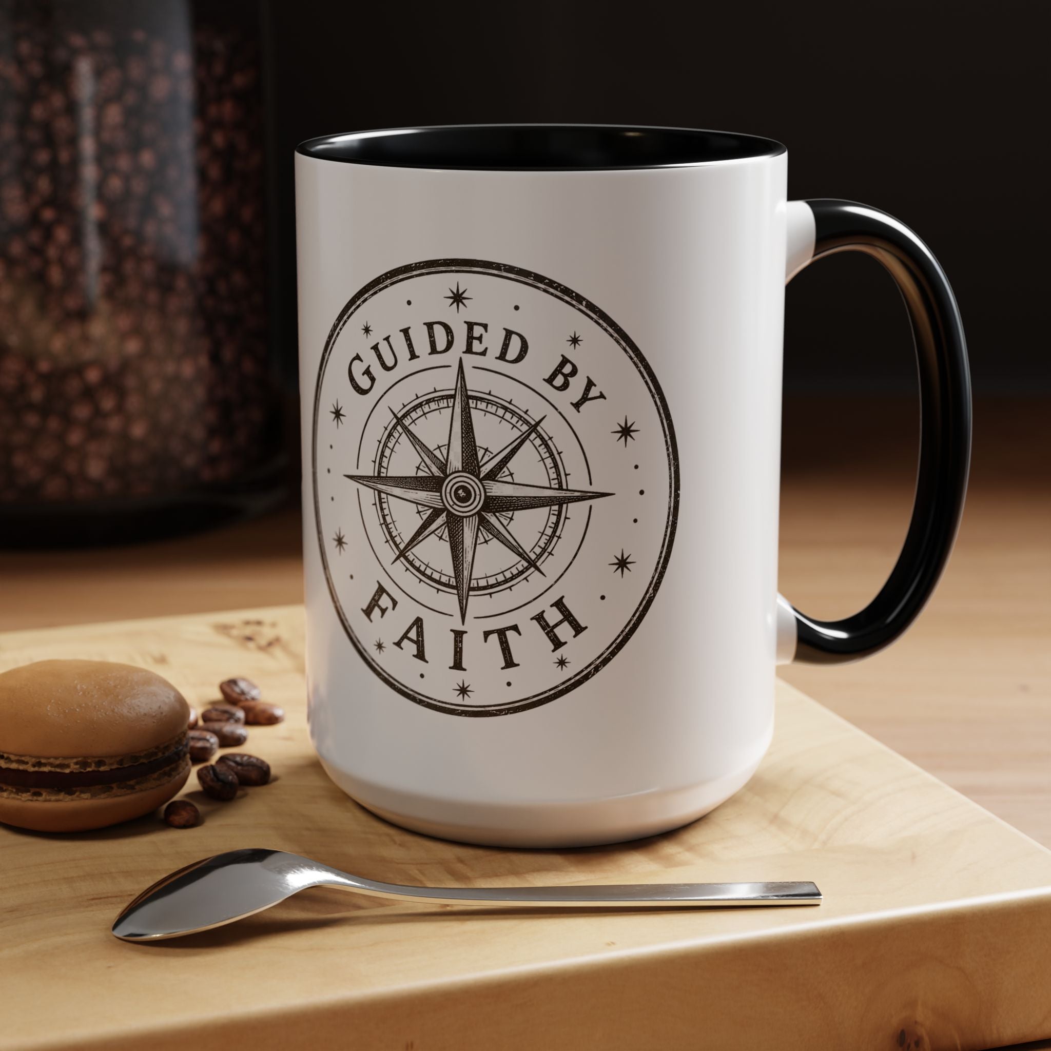 Inspirational ceramic accent coffee mug featuring a compass design and “Guided by Faith” message with colorful handle and interior accents on a glossy white mug.