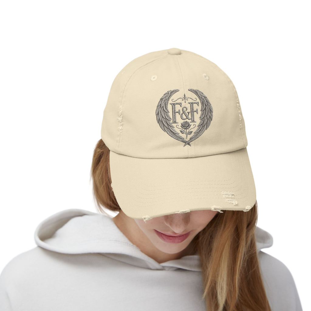 Distressed black Christian cap featuring the Faith & Freedom wing crest logo with feathered wings and vintage washed low-profile styling.
