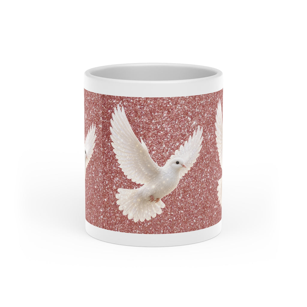 White ceramic heart-shaped handle mug featuring white doves flying across a shimmering rose gold sparkle background with vibrant wraparound artwork.