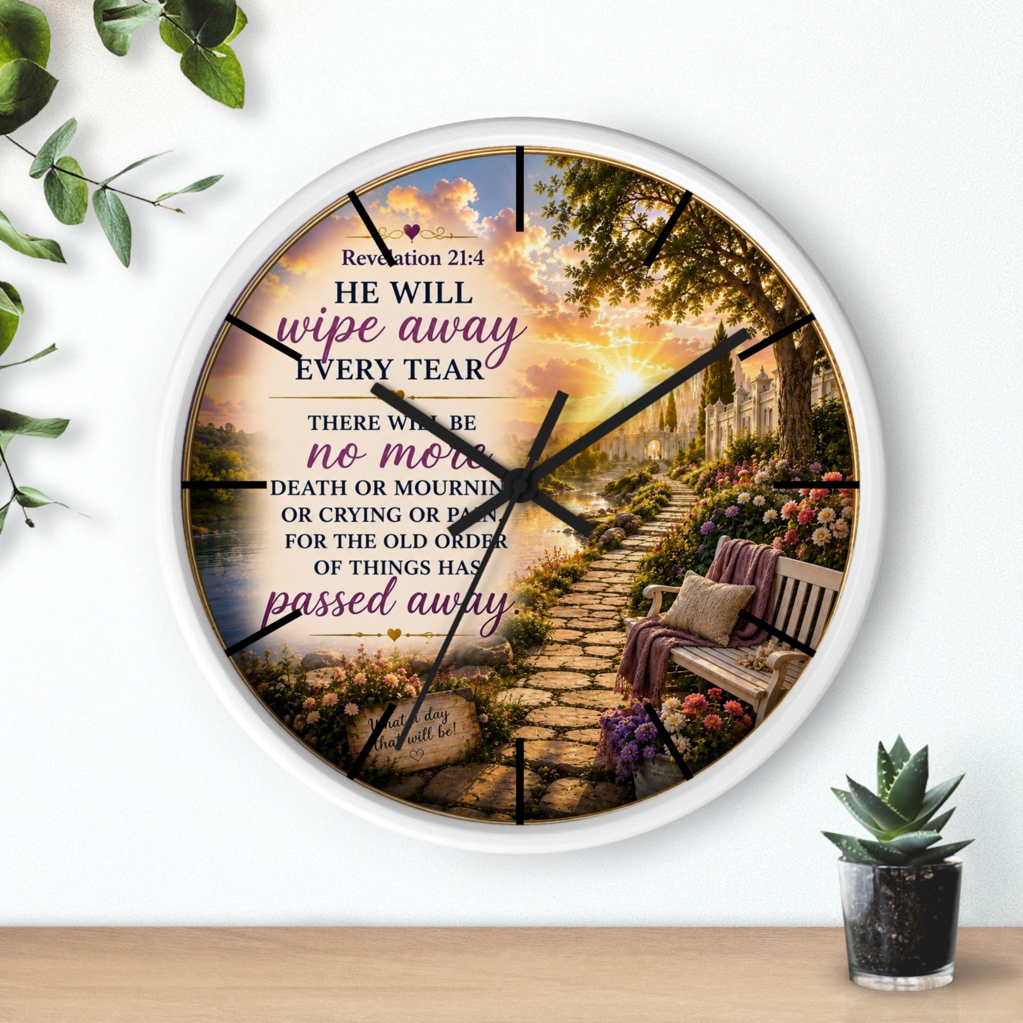 Inspirational Christian wall clock featuring a peaceful lakeside garden path, floral scenery, and Revelation 21:4 scripture in warm comforting tones.