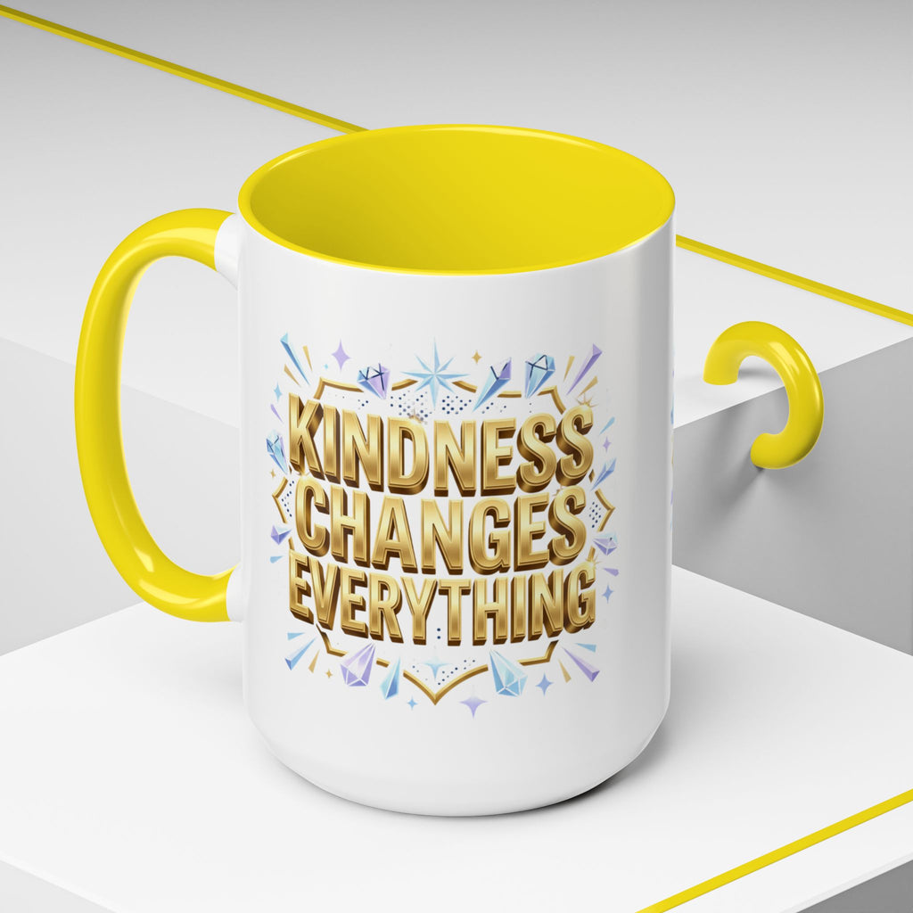 Inspirational ceramic accent coffee mug featuring “Kindness Changes Everything” in elegant gold script with sparkles and colorful accent handle and interior.