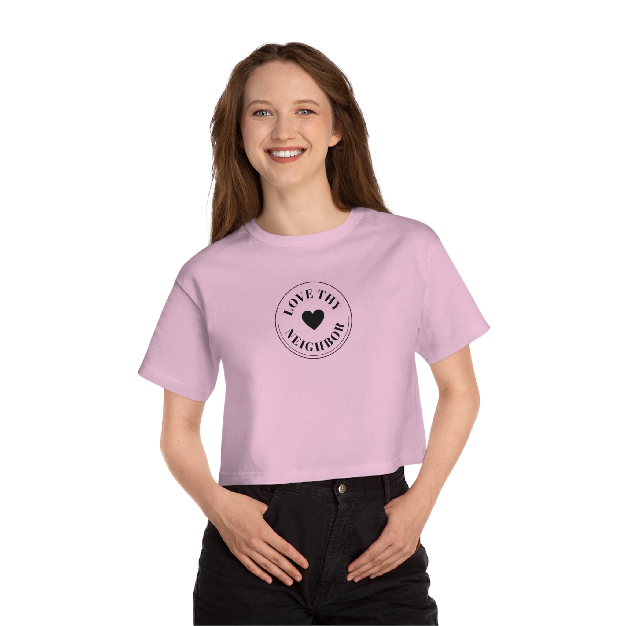 Woman wearing a pink t-shirt with 'LOVE THY NEIGHBOR' on a white background