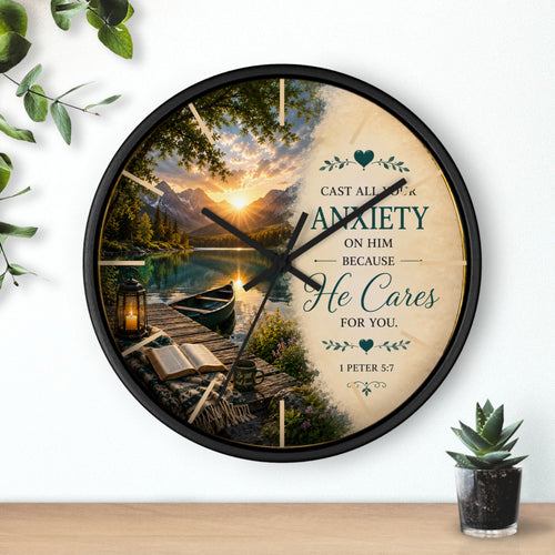 Inspirational Christian wall clock featuring a peaceful lakeside sunrise with a dock, canoe, and 1 Peter 5:7 scripture about casting anxiety on Him.