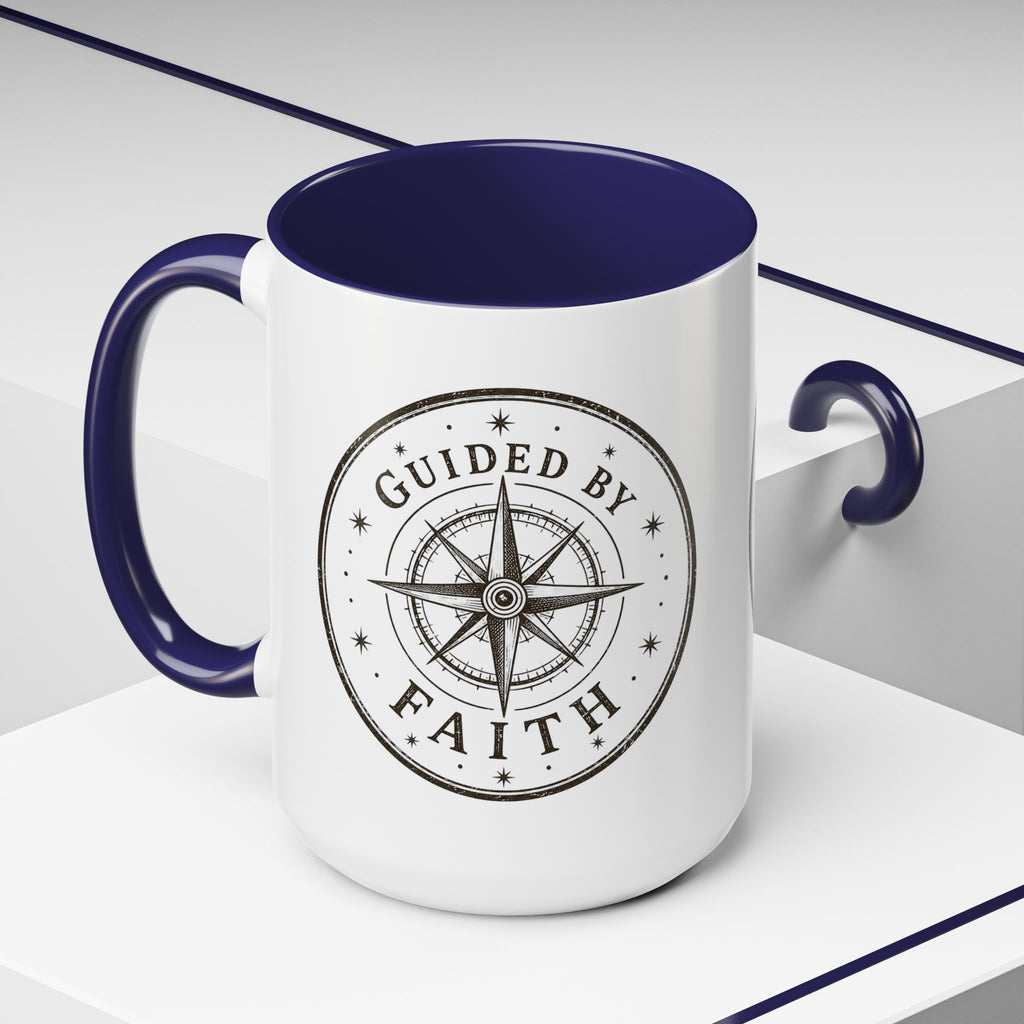 Inspirational ceramic accent coffee mug featuring a compass design and “Guided by Faith” message with colorful handle and interior accents on a glossy white mug.