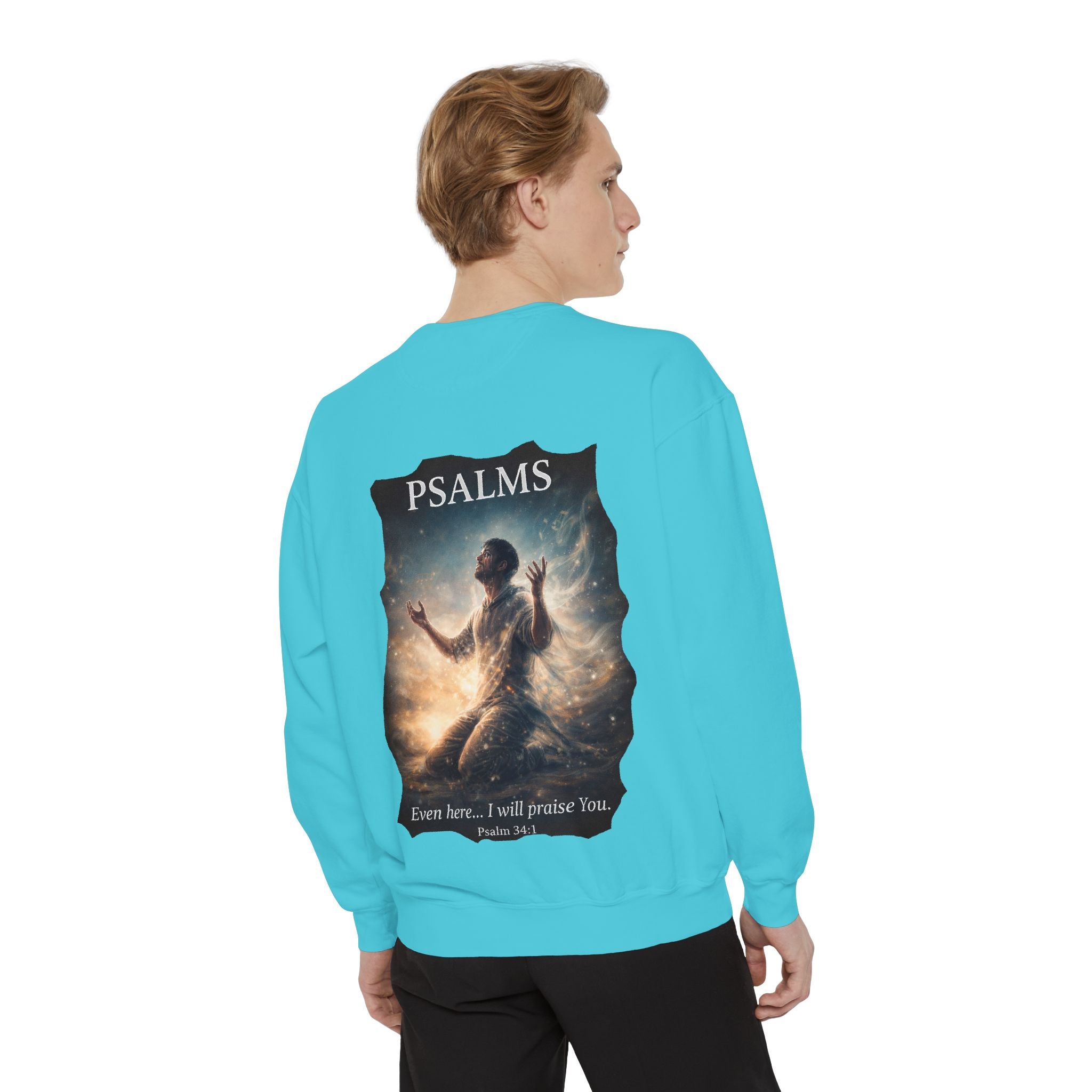 Christian crewneck sweatshirt featuring Psalm 34:1 inspired devotional artwork with subtle front embroidery and a dramatic faith-inspired back design.