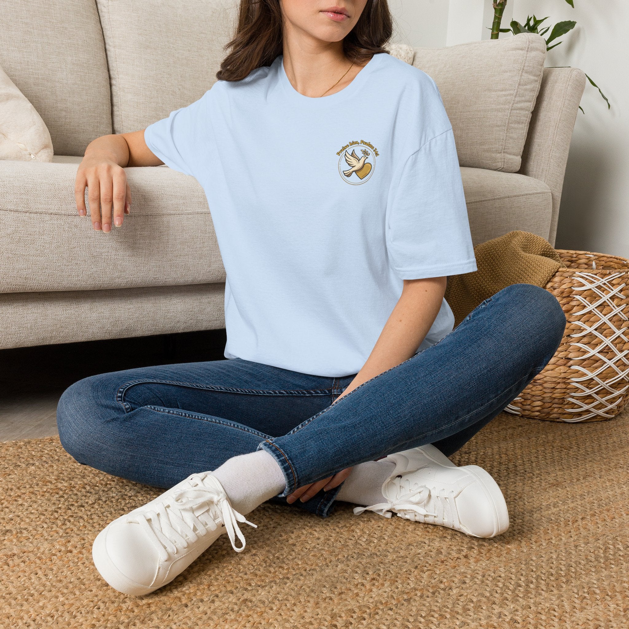 Minimalist Christian T-shirt featuring a Dove of Peace chest emblem with the words “Pray, Love, Remember” on a soft lightweight faith-inspired tee.