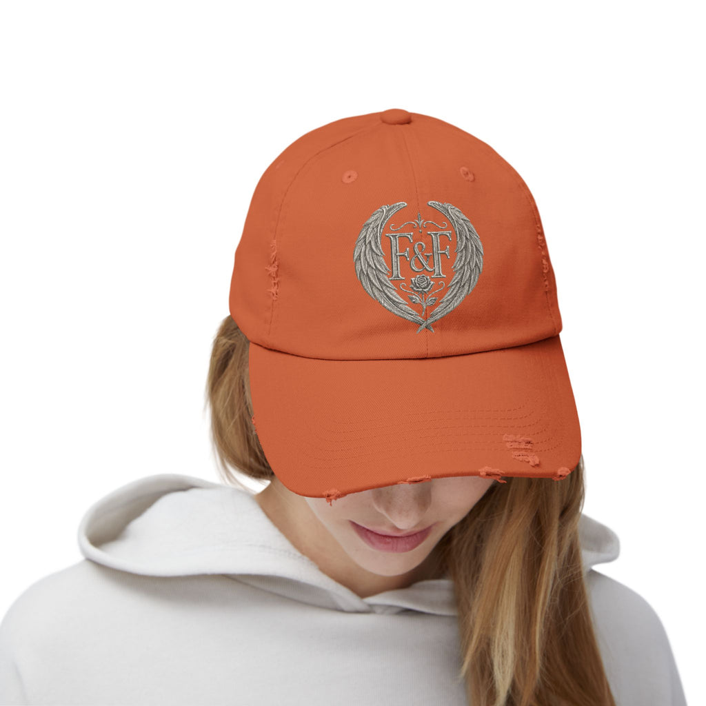 Distressed black Christian cap featuring the Faith & Freedom wing crest logo with feathered wings and vintage washed low-profile styling.