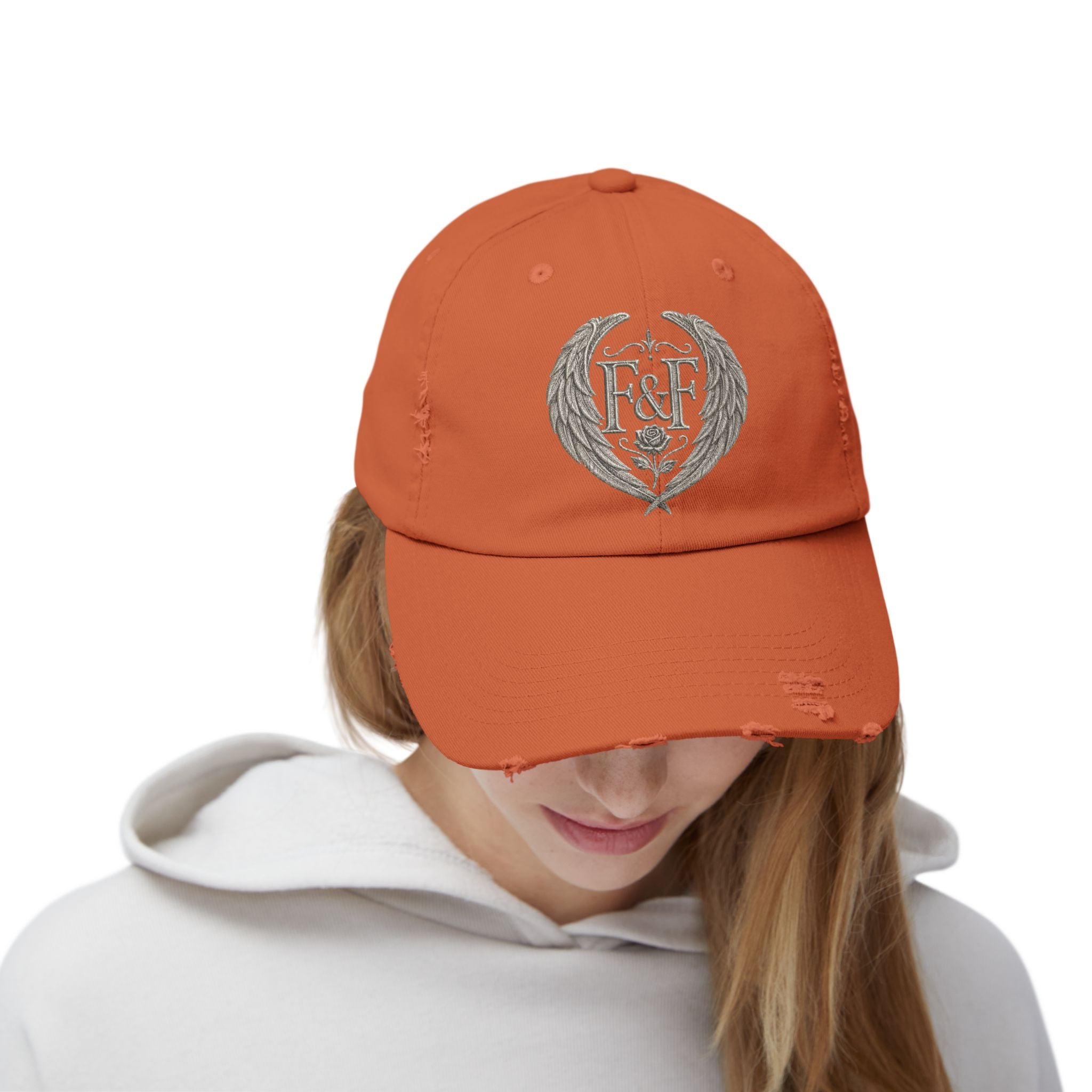Distressed black Christian cap featuring the Faith & Freedom wing crest logo with feathered wings and vintage washed low-profile styling.