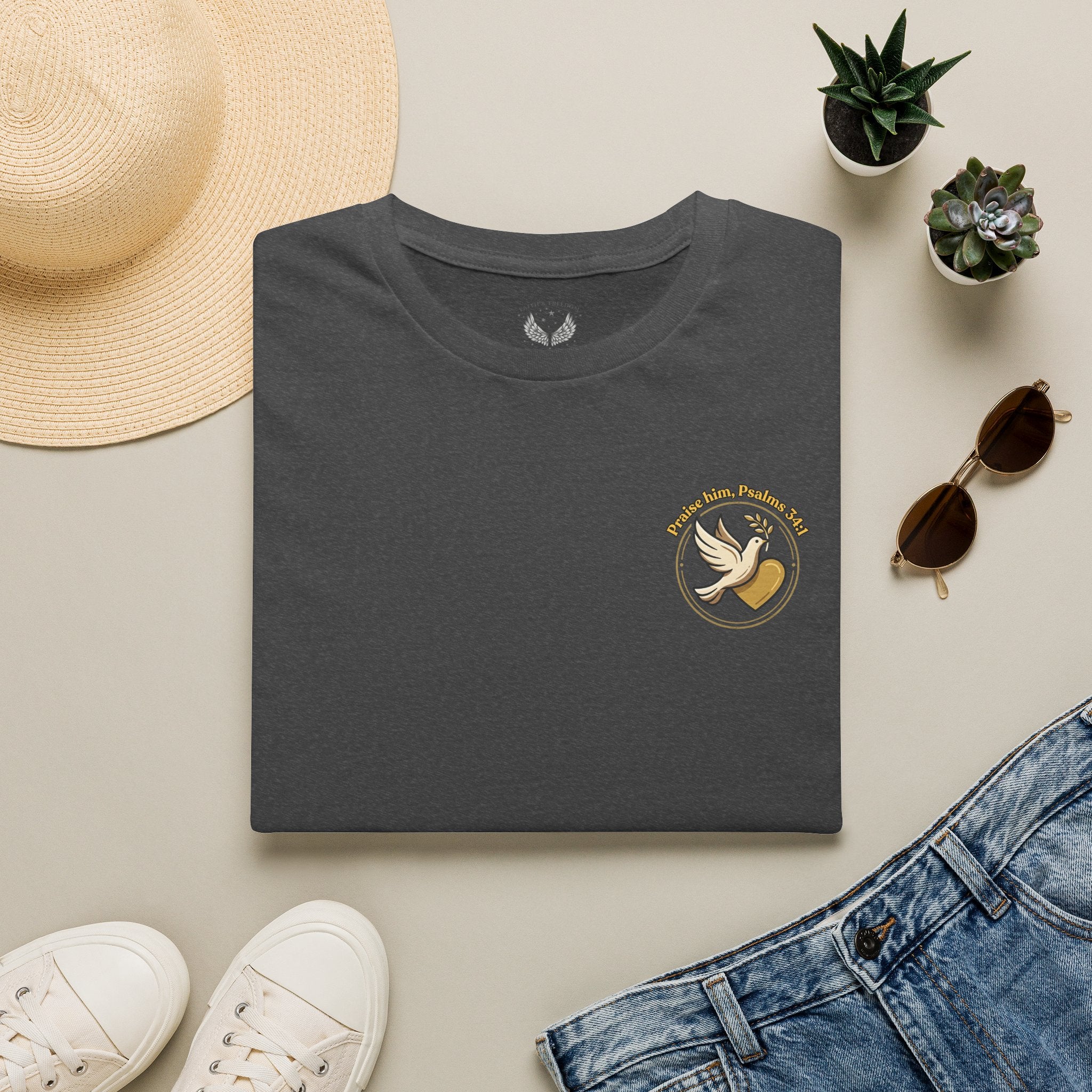 Minimalist Christian T-shirt featuring a Dove of Peace chest emblem with the words “Pray, Love, Remember” on a soft lightweight faith-inspired tee.