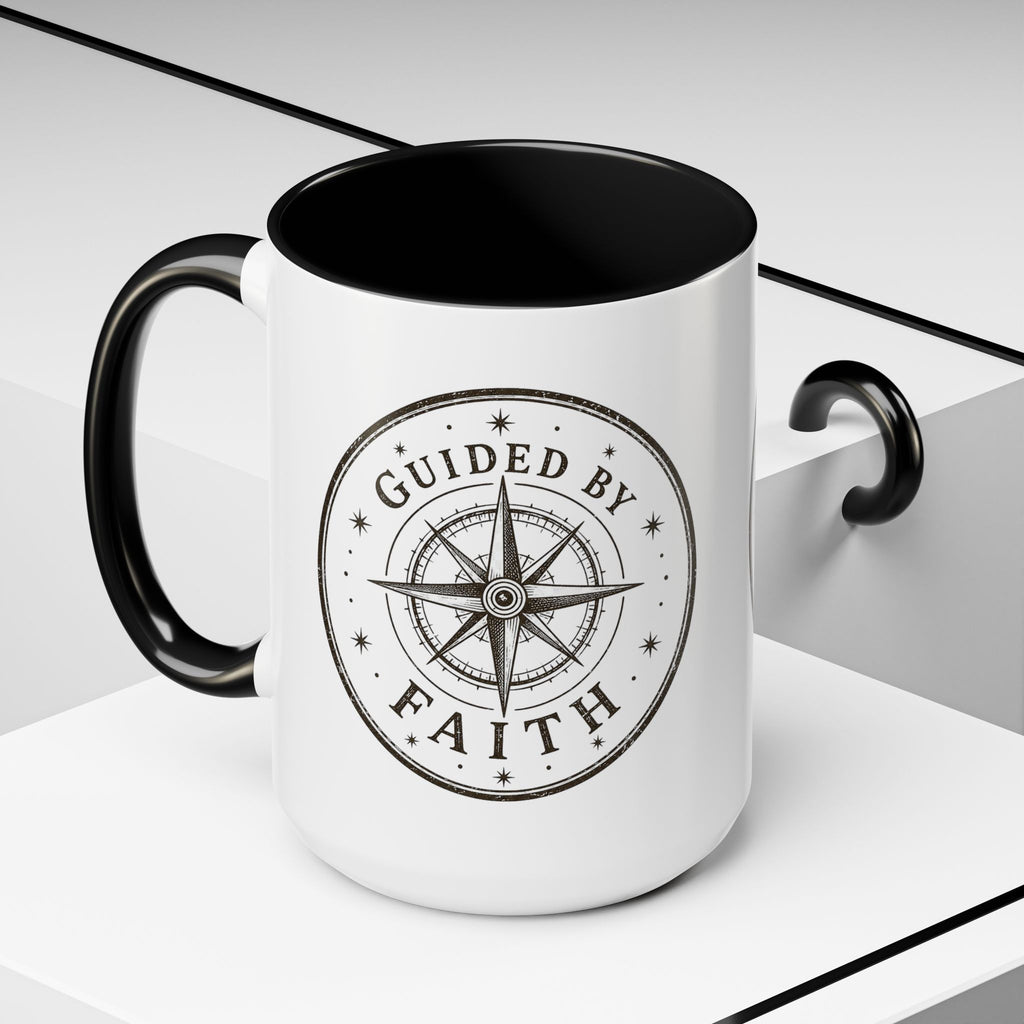 Inspirational ceramic accent coffee mug featuring a compass design and “Guided by Faith” message with colorful handle and interior accents on a glossy white mug.
