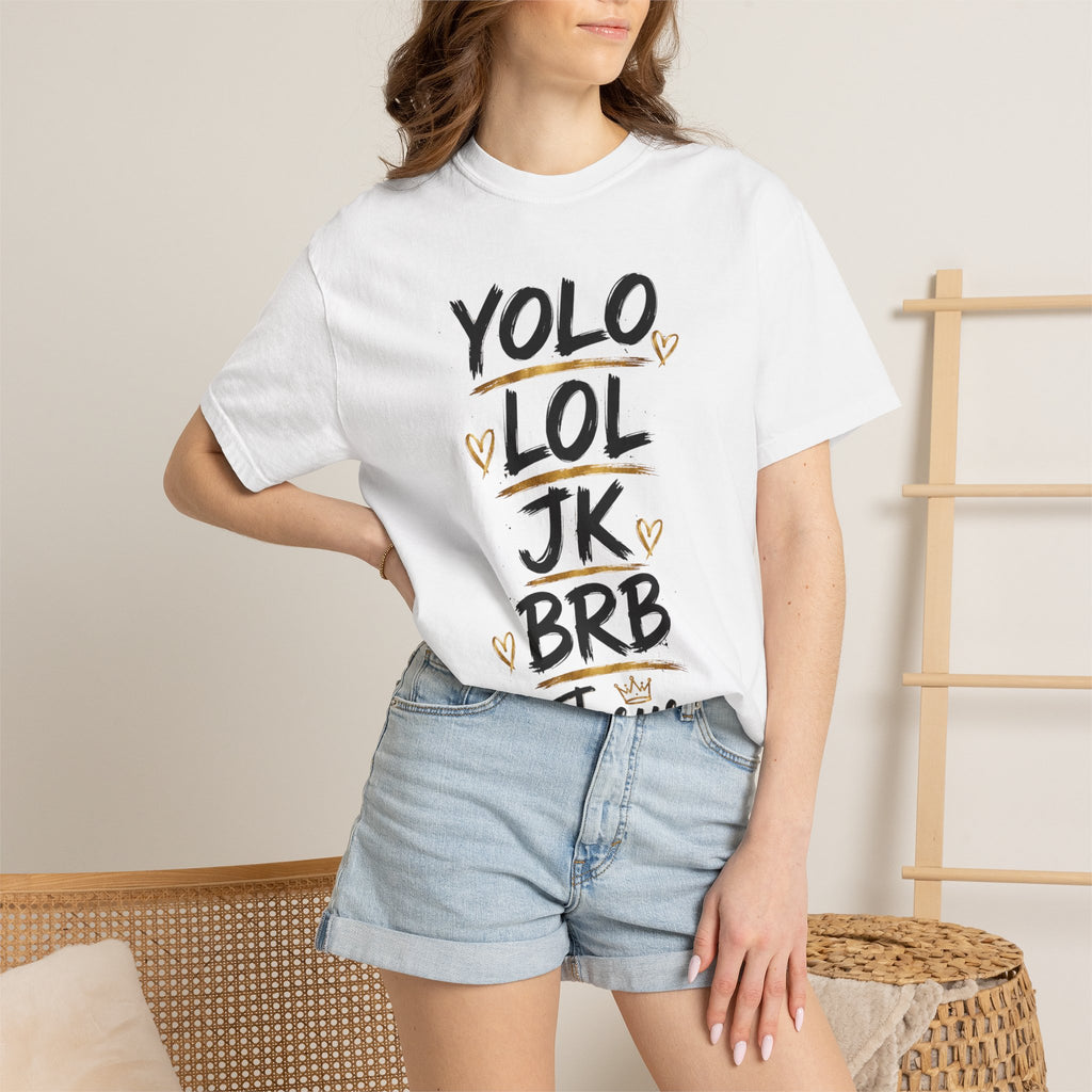 Garment-dyed unisex Comfort Colors T-shirt featuring black YOLO LOL JK BRB ~Jesus brush lettering with gold accent lines, small hearts, and a crown above Jesus.