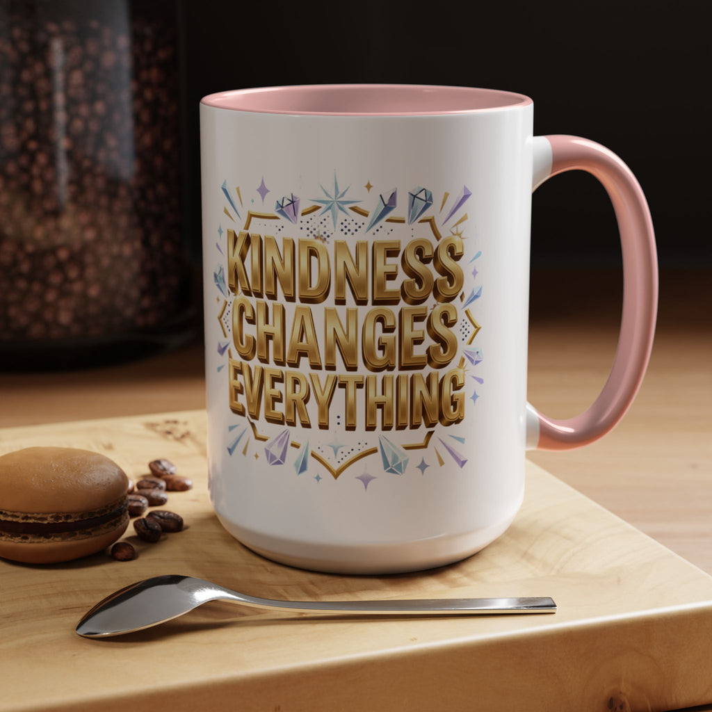 Inspirational ceramic accent coffee mug featuring “Kindness Changes Everything” in elegant gold script with sparkles and colorful accent handle and interior.