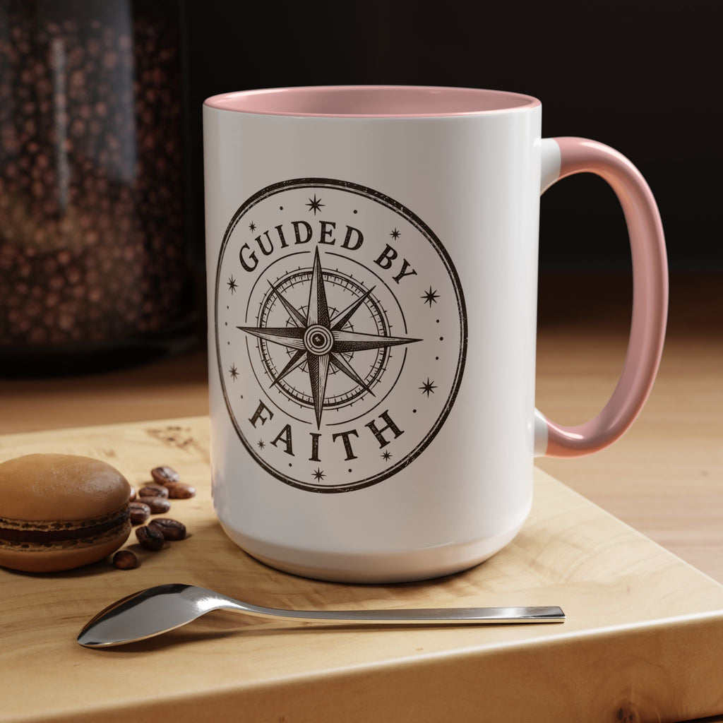 Inspirational ceramic accent coffee mug featuring a compass design and “Guided by Faith” message with colorful handle and interior accents on a glossy white mug.